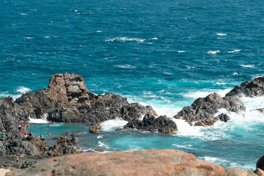 Aruba Natural Pool Conchi surrounded by the rugged coastline of Arikok National Park